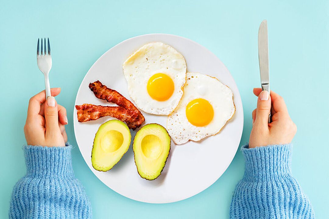 The perfect breakfast on the keto diet menu eggs with bacon and avocado